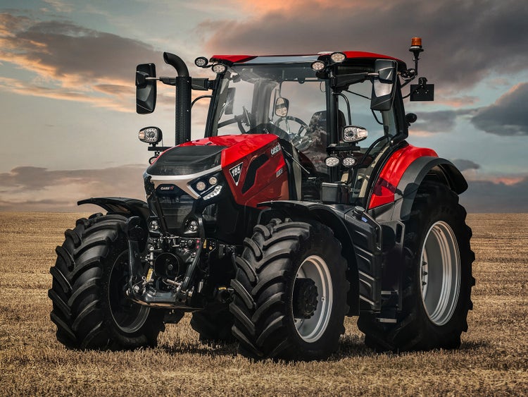 Case IH 185 auf einem Stoppelfeld