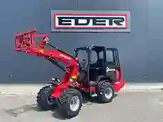 Roter Thaler Hoflader vor dem EDER Logo